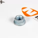 ZQ32318T13F6 SITRAK Шестигранная фланцевая гайка М18*1,5 (для v-образной тяги)