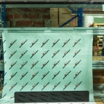 Стекло лобовое переднее Terex 6099916M1