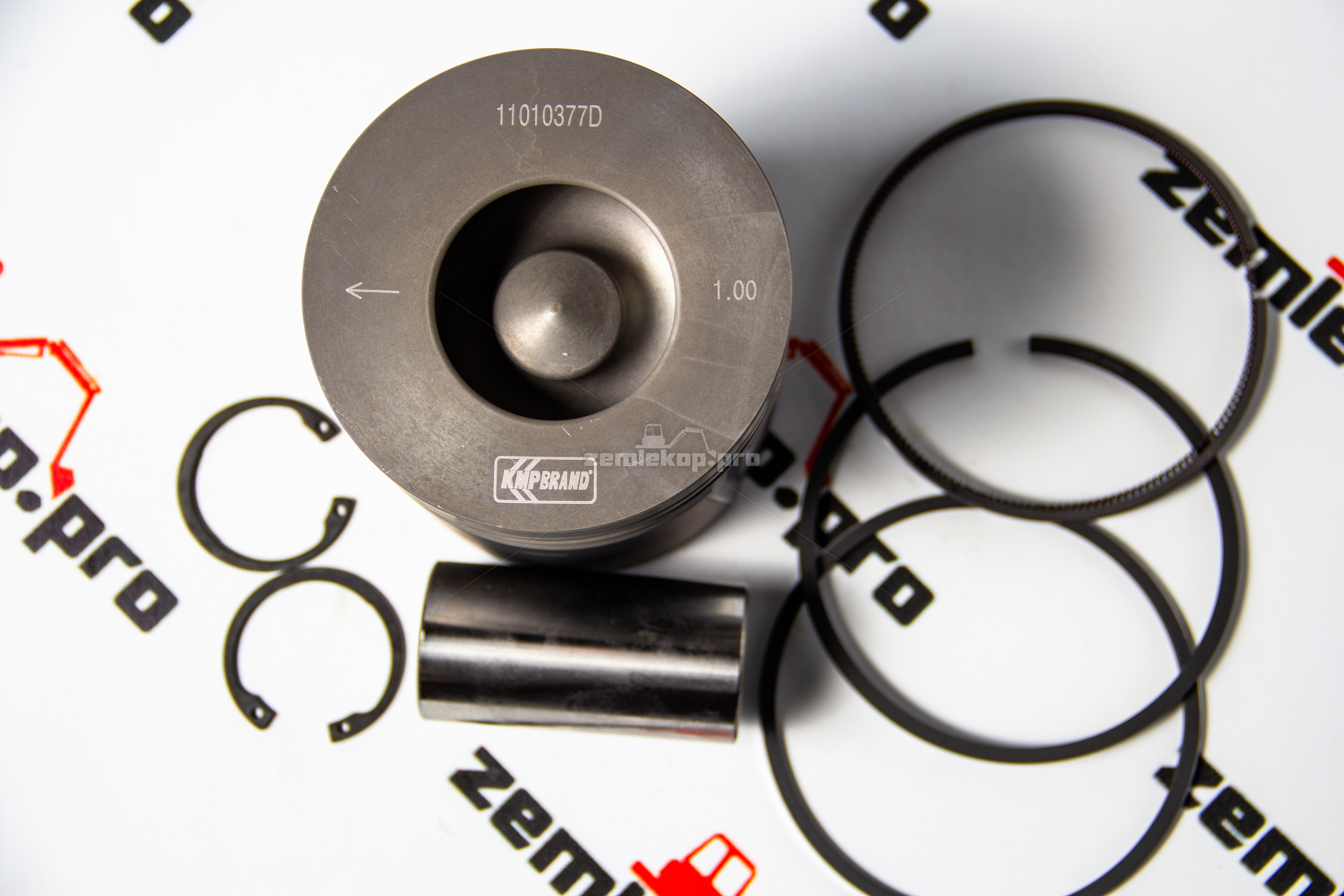 4115P013 Поршень в сборе KMP